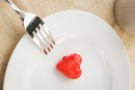Light meal with close up of sweet food or  deletable imitation fruits  heart shape 