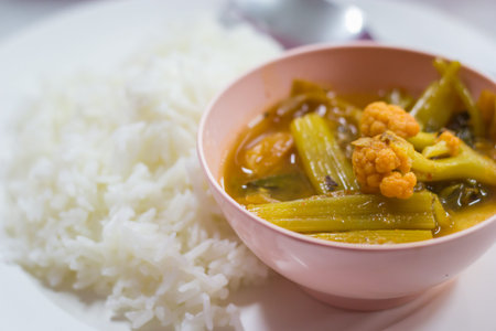 Hot and sour, fish and vegetable ragout with riceの写真素材