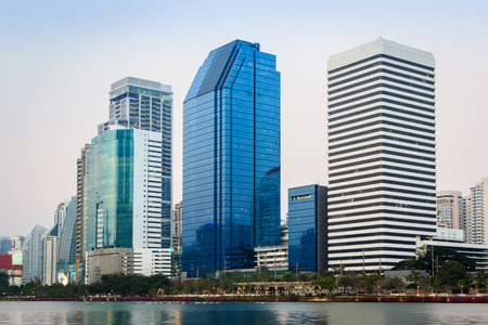 Cityscape, office buildings and apartments in Thailand at dusk  View from public park の写真素材