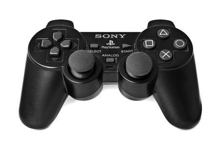 Bangkok, Thailand - June 1: PlayStation Controller isolated on white background on June 1, 2014 in Bangkok, Thailand. The PlayStation Controller was the first gamepad released by Sony Computer Entertainment for its PlayStation video game console. The origのeditorial素材