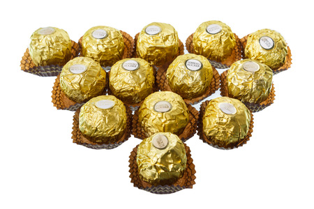 BANGKOK, THAILAND - JULY 6, 2014: Ferrero Rocher Chocolates on a white backgroundのeditorial素材