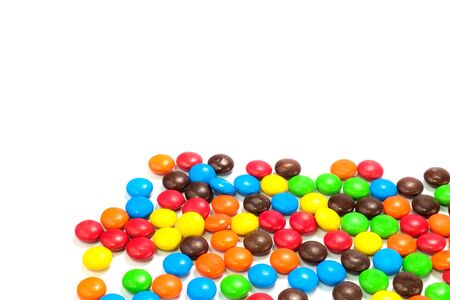 A pile of colorful chocolate coated candyの写真素材