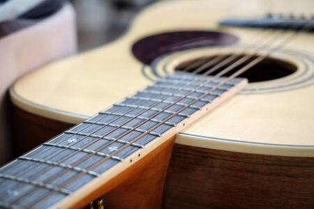 Closeup of acoustic guitar with shallow depth of fieldの写真素材