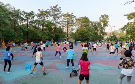 Bangkok Thailand   January 16 2015: Diverse group of people in public park doing aerobics on January 16 2015 in Bangkok.のeditorial素材