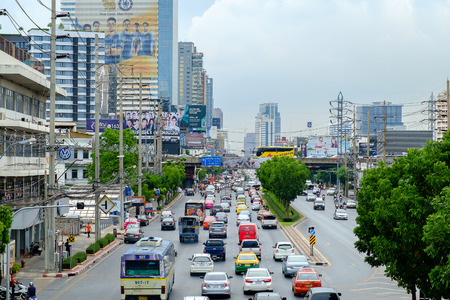 Bangkok, Thailand - June 3, 2015: Traffic moves slowly along a busy road on June 3, 2015 in Bangkok, Thailand. Annually an estimated 150,000 new cars join the already heavily congested streets of Bangkok.のeditorial素材