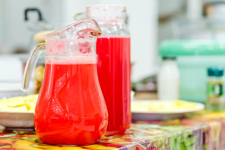 Summer iced drink - red soda juice in pitcher.の写真素材