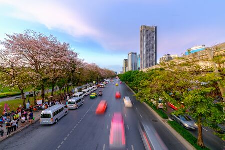 Bangkok, Thailand - April 9, 2017: Cityscape of light trails with blurred colors on the street at dusk.のeditorial素材