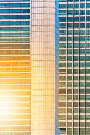 Office building window close up with sunlightの写真素材