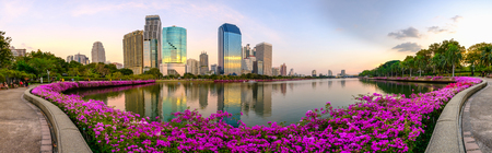 Bangkok city downtown at dusk with reflection of skyline, Thailandの写真素材