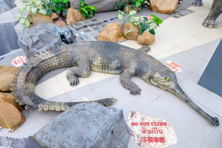 Bangkok, Thailand - April 5, 2017: Ancient Crocodile model in Lok Sarakadee Program PPTV HD 36, Dinosaur planet Exhibit at Siam Paragon, Bangkok Thailand.のeditorial素材