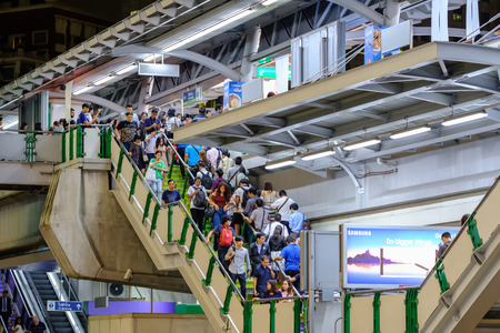 Bangkok, Thailand - November 21, 2017: Big delays for BTS users today, Forcing all passengers to switch trains at the busy interchange.のeditorial素材