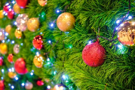 Christmas background - baubles and branch of spruce tree, Selective focus.の写真素材