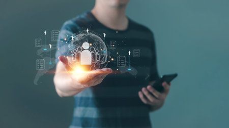 Customer Relationship Management, Businessman hand holding global customer service network technology, HR or hiring to marketing the corporate, Digital data cloud system links global customer data.の写真素材