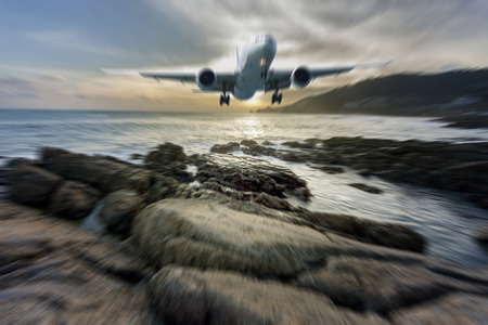 Airplane in the sky with Blurred background, zoom effect,flights in bad weather day conceptの写真素材