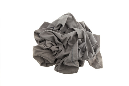 pile dirty clothe isolated on white backgroundの写真素材