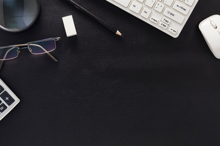 business objects of pencils,computer and supplies on office desk