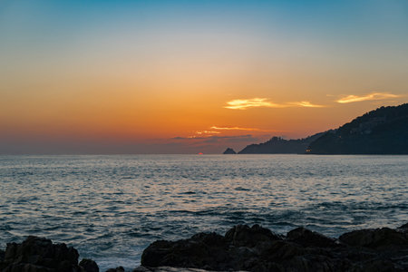 Beautiful colorful color and light sunset or sunrise over tropical andaman sea at phuket thailandの写真素材