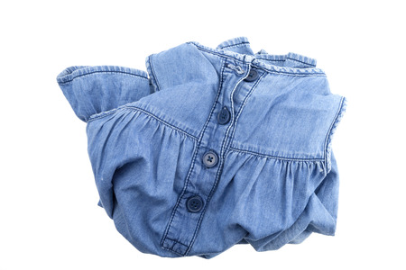 pile dirty clothes isolated on white backgroundの写真素材