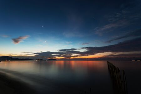 Seascape in the sunrise long exposure,beautiful light and dramatic sky colorful colorの写真素材