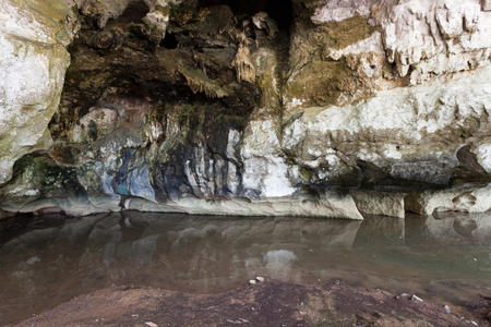 Small river in the stone caveの写真素材