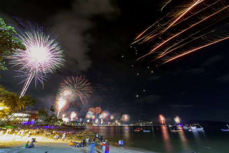 Festive New Year 2019 with fireworks People celebrate New year day at patong city phuket thailand.の写真素材