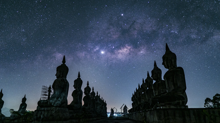 Big Buddha statue with milky way galaxy in Nakhon si thammarat Province, Thailand.の写真素材