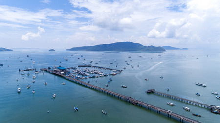 Chalong pier with sailboats for travel image by Drone flying shot.の写真素材