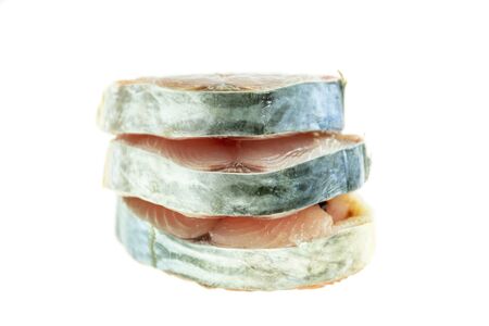 Fish Scomberomorus pieces isolated on white background.の写真素材