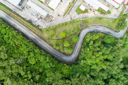 Asphalt road curves image by Drone bird's eye view.