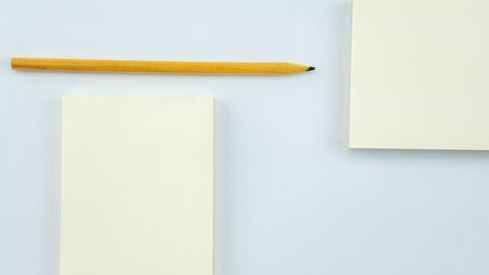 business white paper card and pencil on white background.の写真素材