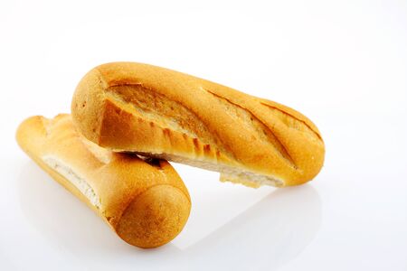 Two bread loaf isolated on white background.の写真素材