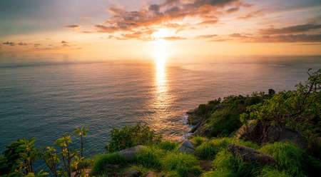 Beautiful light of nature sunset or sunrise sky over mountain Beautiful tropical sea landscapeの写真素材