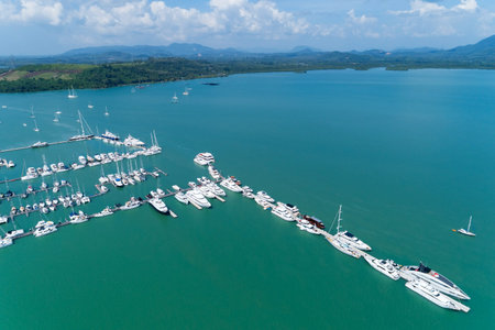 Aerial View Top down Drone shot of Yacht and sailboat parking in marina Transportation and travel...
