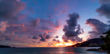 Long exposure colorful sunset or sunrise over sea Clear sky sunset with reflection light on sea surface Idyllic amazing landscape Climate change Beauty in nature environmentの写真素材