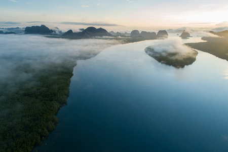 Aerial view drone shot of beautiful ocean against sky in the morning fog mist sunrise drone is...