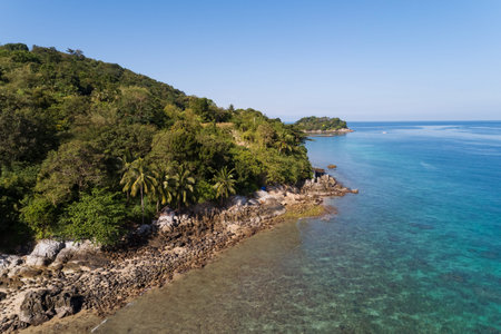 High angle view Tropical sea seashore and mountain located in Phuket Thailand aerial view drone top down Amazing nature view landscape Beautiful sea surface.の写真素材