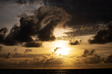 Black clouds over sea Dramatic thunderstorm cloudscape with large building clouds Natural rainy dark...