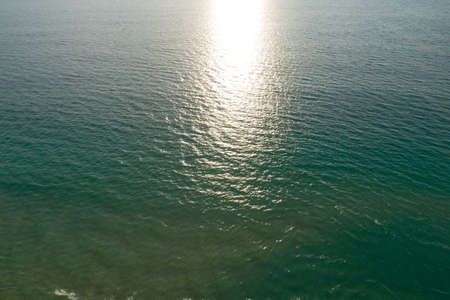 Sea surface aerial view,Bird eye view photo of blue waves and water surface texture Blue sea background Beautiful nature Amazing view.の写真素材