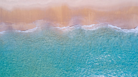 Sea Aerial view Top down sea amazing nature beach background Wave crashing on sandy shore at Phuket...