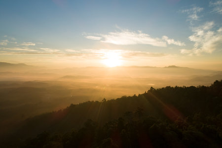 Amazing scenery Nature landscape nature view Aerial view drone camera photography of Mist or fog flowing on Mountain peak in the morning sunrise or sunset At Khao Khai Nui Phang Nga Thailandの写真素材