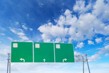 Blank green highway road sign on sky background.Empty road sign copy spaceの写真素材