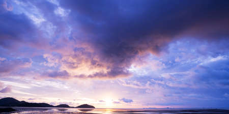Sunset or sunrise sky clouds over sea sunlight in Phuket Thailand Amazing nature landscape seascapeの写真素材