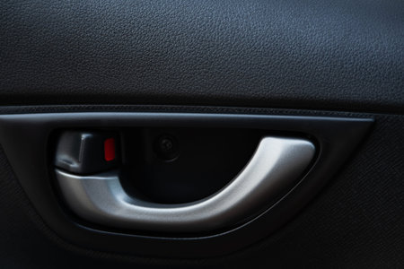 Close up image of new modern car door opener