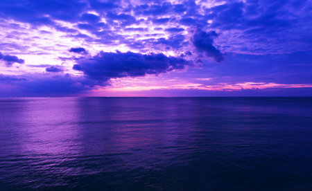 Beautiful Sea in sunset or sunrise light sky over sea in summer season,Image from drone camera,Amazing sea waves ocean sunset sky backgroundの写真素材