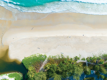 Sea surface aerial view,Bird eye view photo of crashing waves sandy shore,Sea water surface texture,sea background,Beautiful nature seascape,Amazing top view beach backgroundの写真素材
