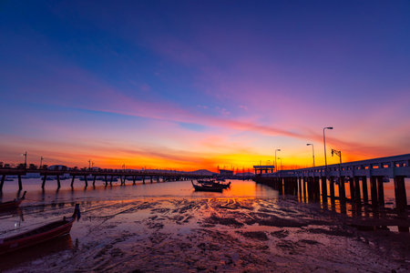 Chalong pier during sunrise or sunset,beautiful colorful dramatic sky in Phuket thailandの写真素材