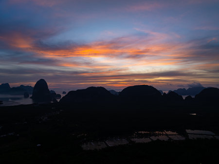 Aerial view sunset sky,Nature beautiful Light Sunset or sunrise over sea,Colorful dramatic majestic scenery sunset Sky with Amazing clouds and waves in sunset sky nature light cloud backgroundの写真素材