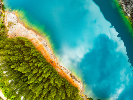 Aerial view of amazing pond in tropical rainforest with mountain rocks peak, Beautiful water surface in Phang Nga Thailandの写真素材