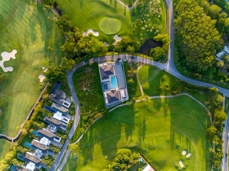Aerial view of beautiful green golf field fairway and putting green, Top down image for sport background and travel nature background, Amazing  green nature viewの写真素材