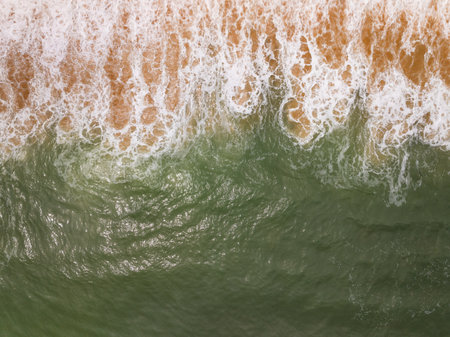 Beautiful sea beach and waves texture in sunny summer day background,Phuket Thailandの写真素材